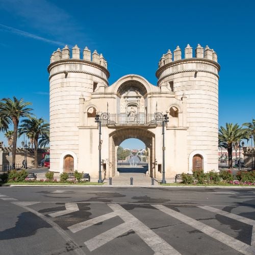 An old stone city gate in Badajoz, Spain.