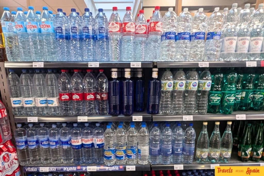 Wide selection of bottled water brands available in Gran Canaria supermarket
