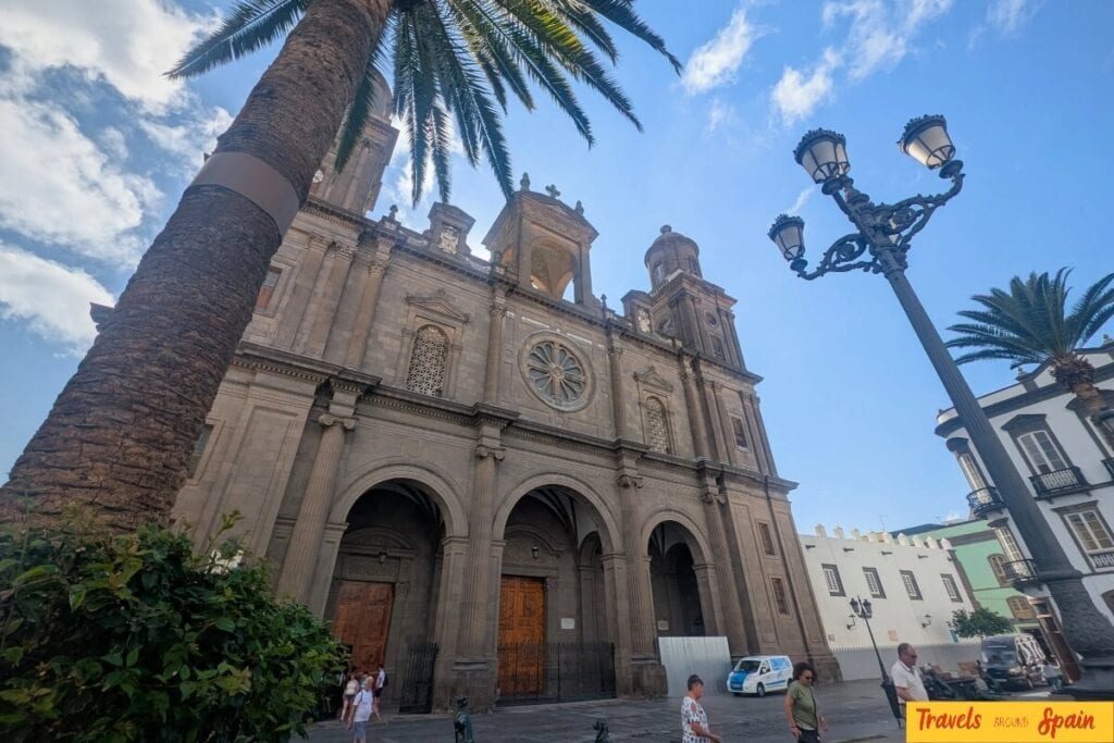Las Palmas Cathedral Santa Ana façade with palm trees Gran Canaria.