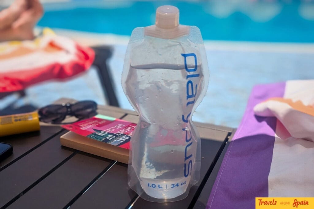 Platypus 1-litre collapsible water bottle filled with Gran Canaria tap water by hotel pool