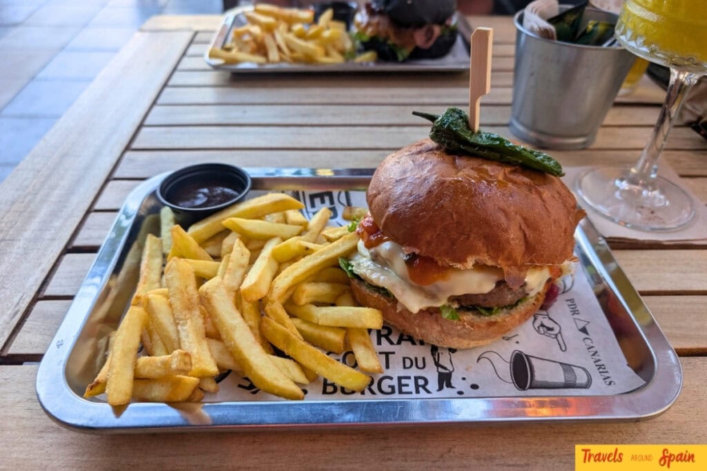 Gourmet burger with chips at Good Vibes, one of the best value restaurants in Maspalomas