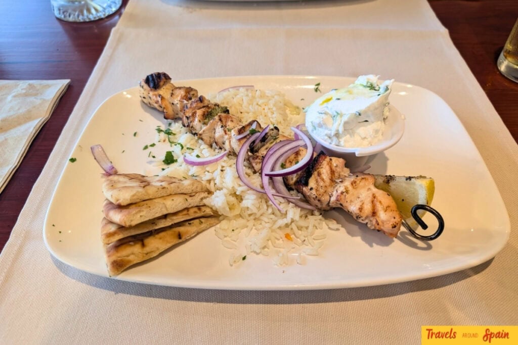 Grilled chicken souvlaki with pita bread and tzatziki at Greek Village Restaurant in Maspalomas