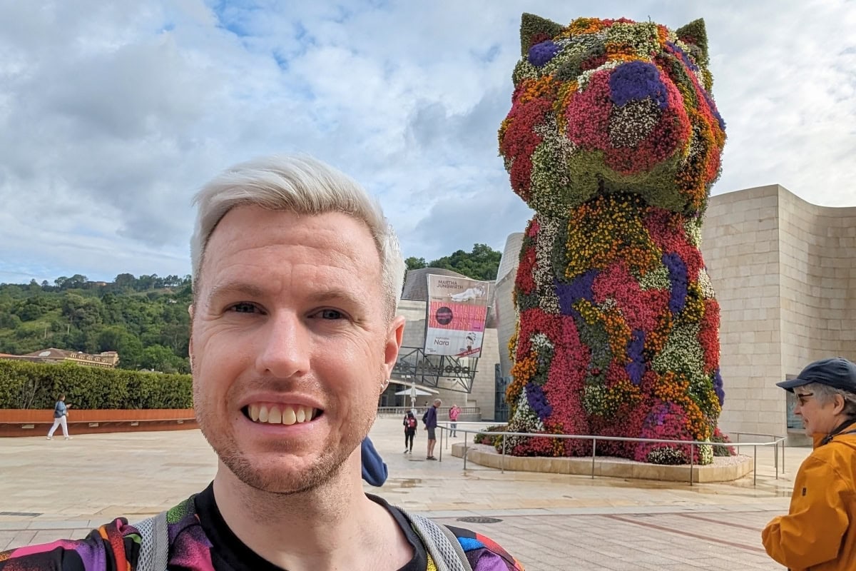 Liam exploring the Puppy sculpture at Guggenheim Bilbao