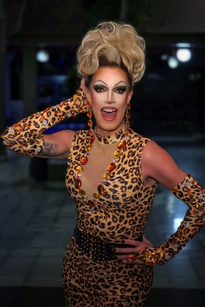 Heather Phetish drag queen in leopard print outfit with blonde beehive hair at Sparkles Bar Maspalomas