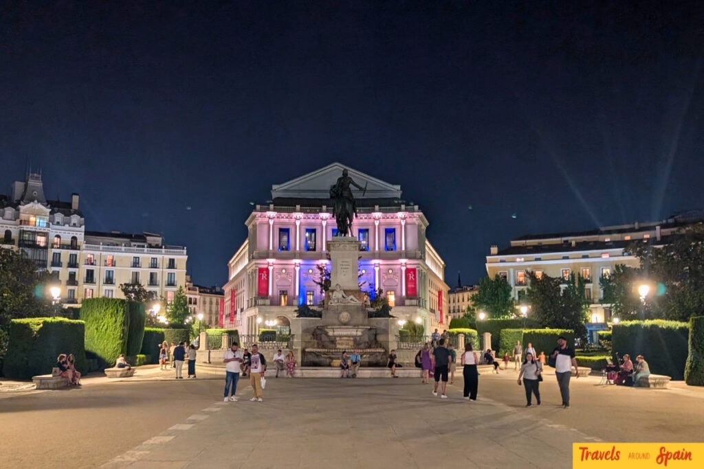 Madrid evening atmosphere showing illuminated plaza and nightlife