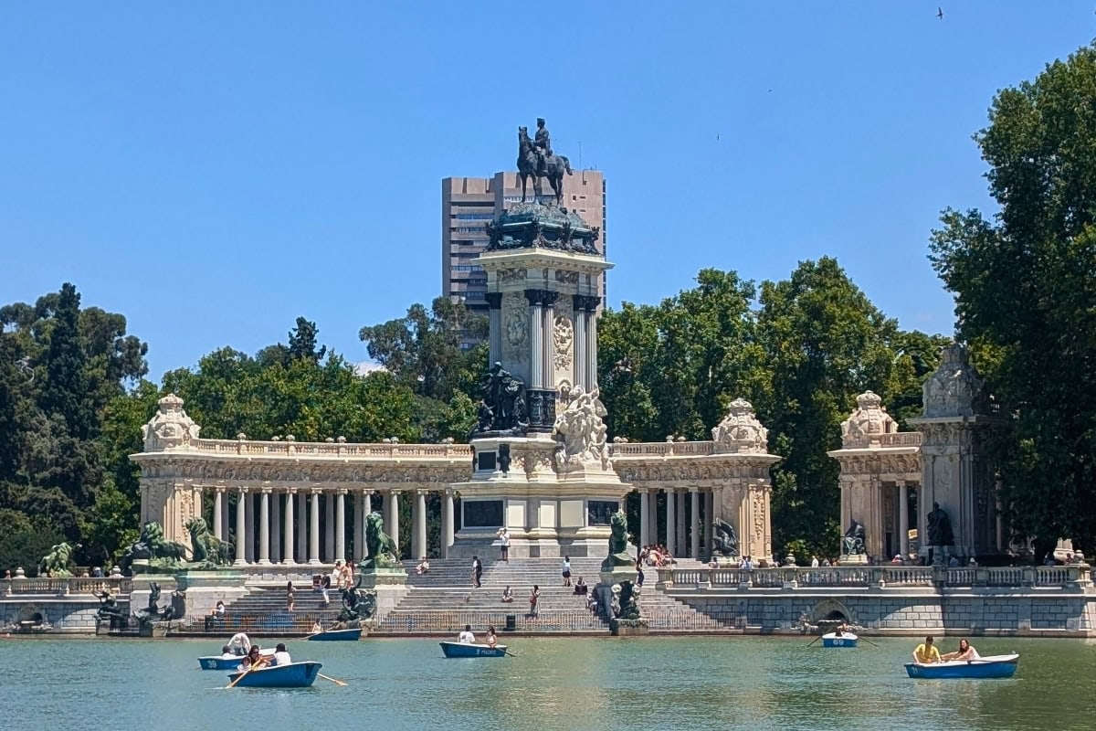 Madrid Retiro Park with Alfonso XII monument overlooking the lake