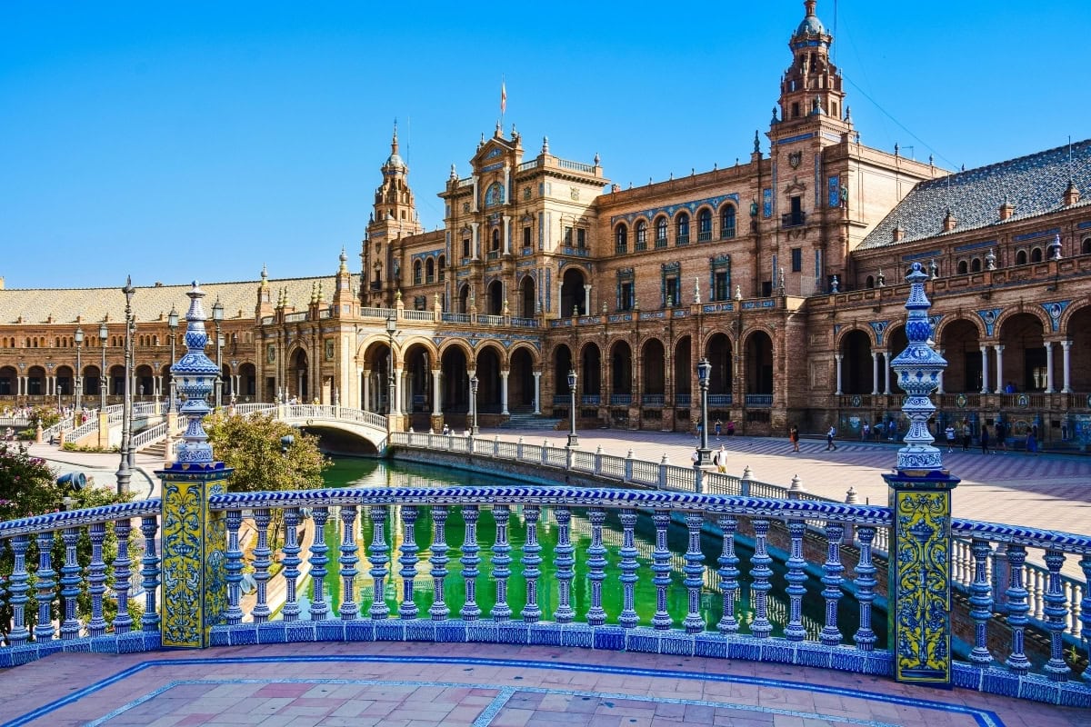 Plaza de España featuring stunning blue tiles and Renaissance Revival architecture