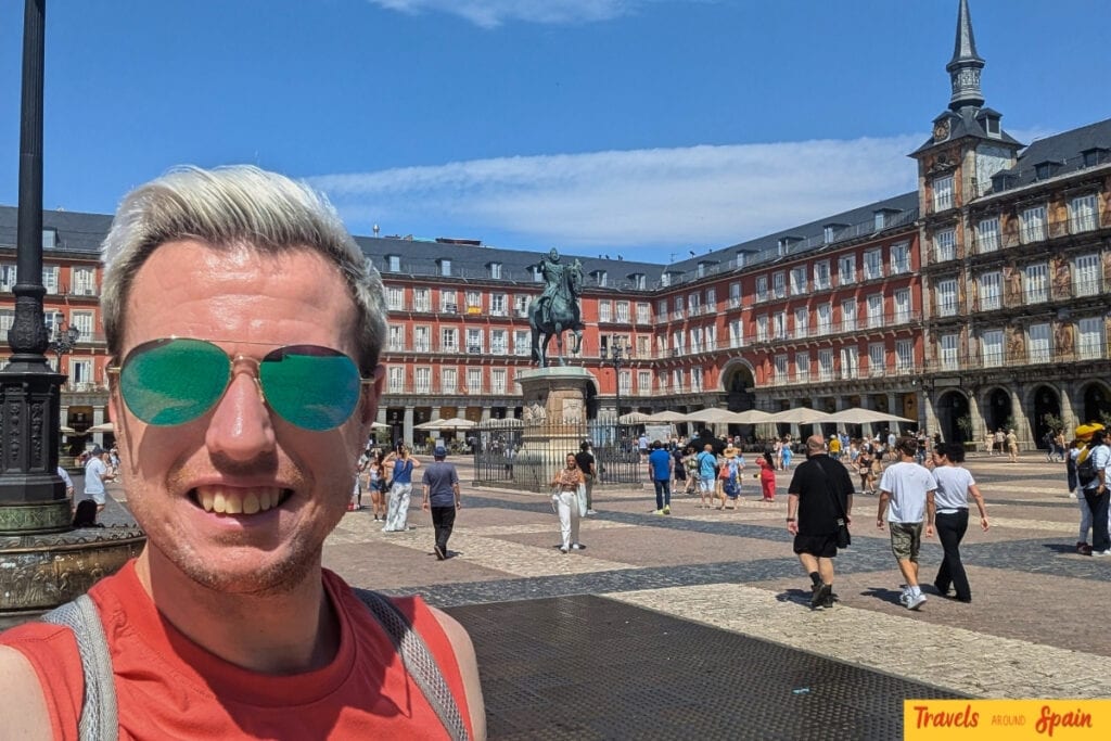 Travel blogger at Plaza Mayor Madrid during 2-day itinerary