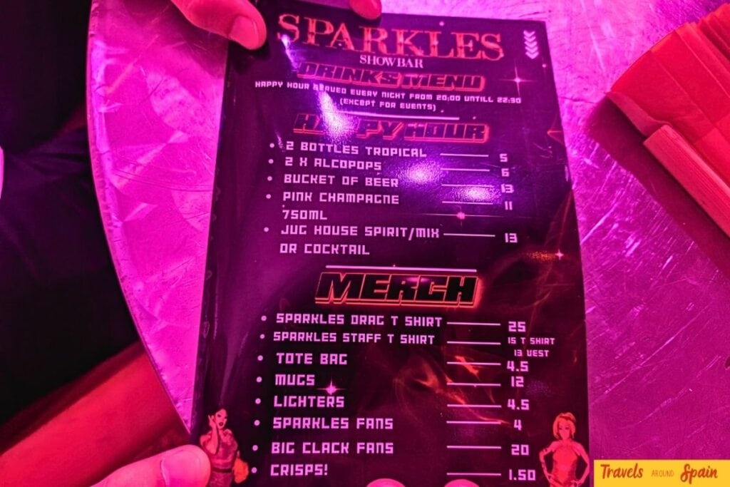 Sparkles Bar Maspalomas drink menu showing cocktail pitchers for €13 during happy hour until 10:30pm.
