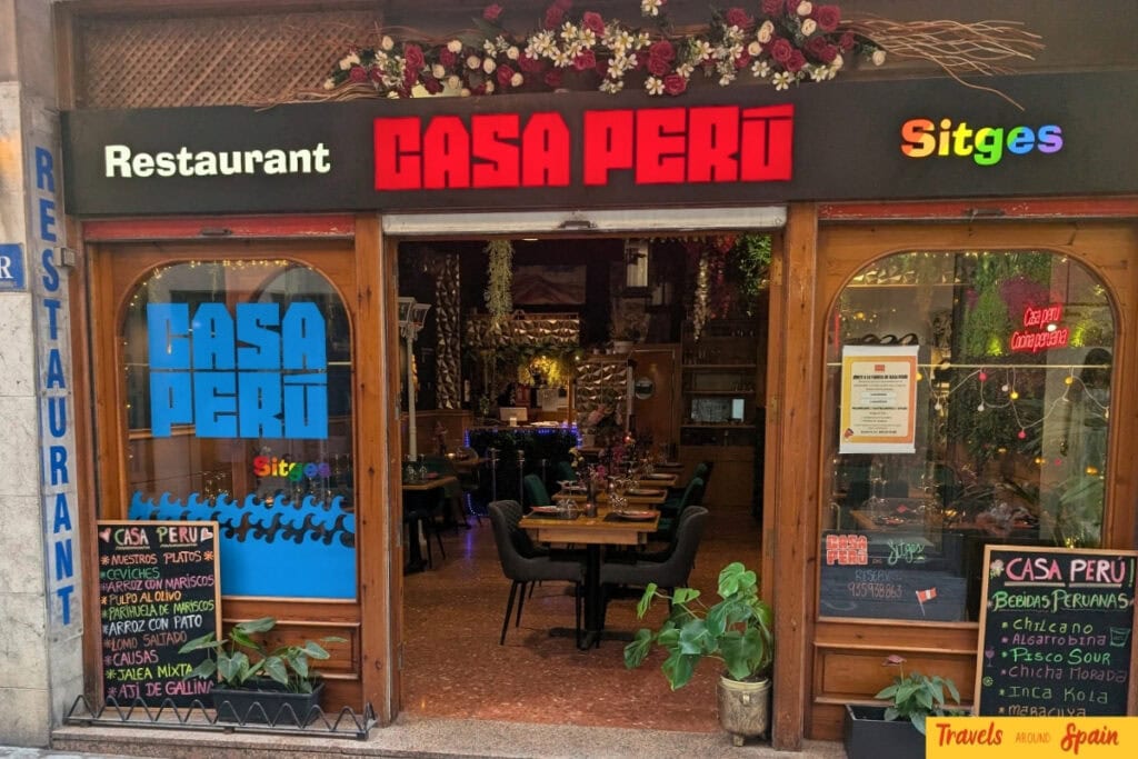 Front of Casa Perú restaurant in Sitges with outdoor signage.