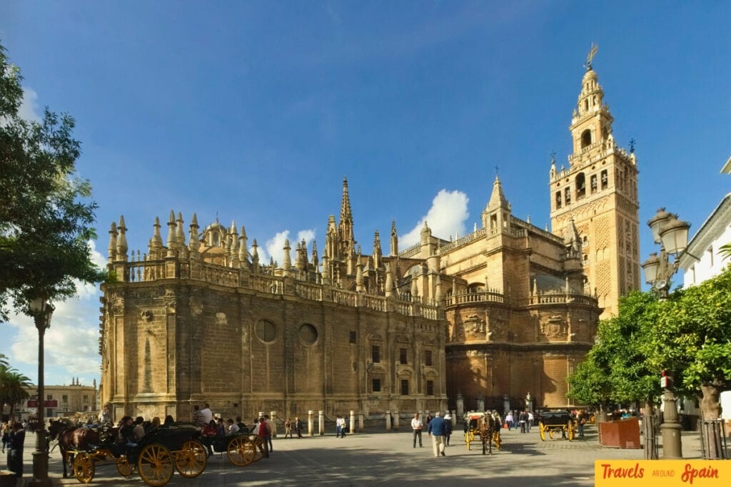 Seville Cathedral and Giralda Tower in autumn sunlight