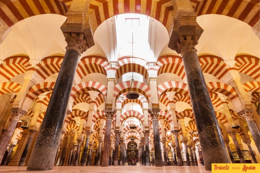 Interior arches of the Mezquita-Catedral in Córdoba, a popular October day trip from Seville.