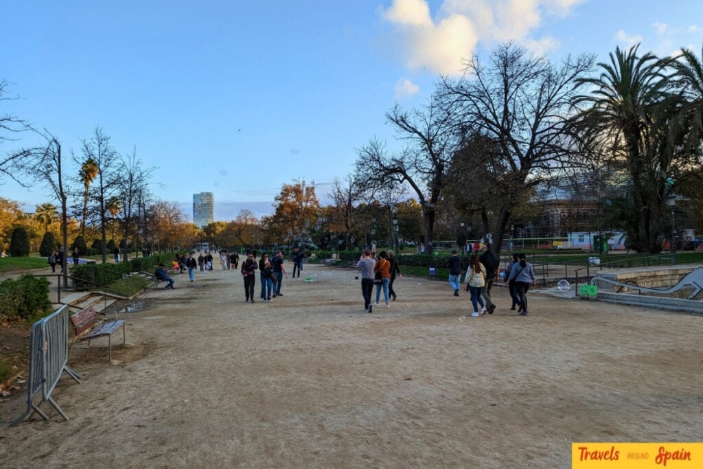 Locals enjoying an autumn walk in a Barcelona park