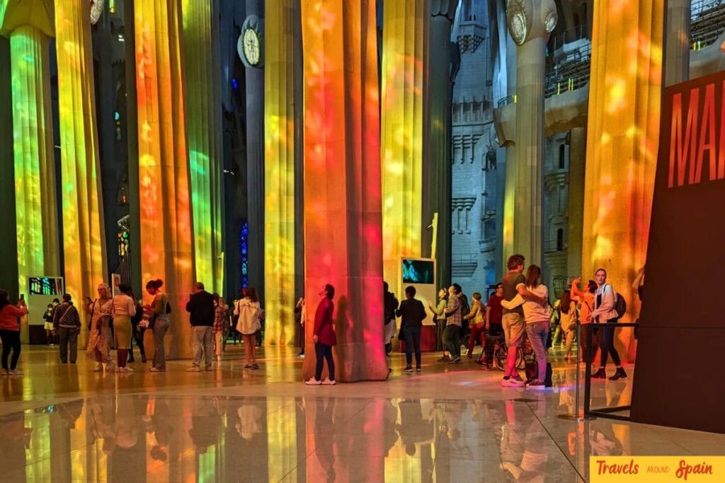 Sunlight shining through the stained glass of the Sagrada Família in November