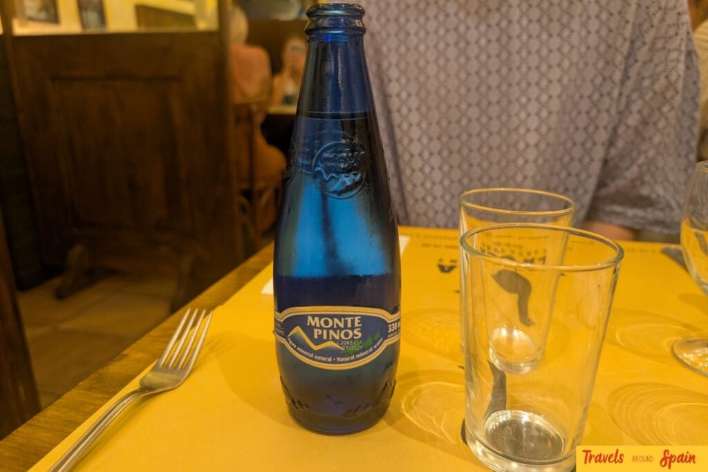 Blue Monte Pinos bottled water served at a Spanish restaurant