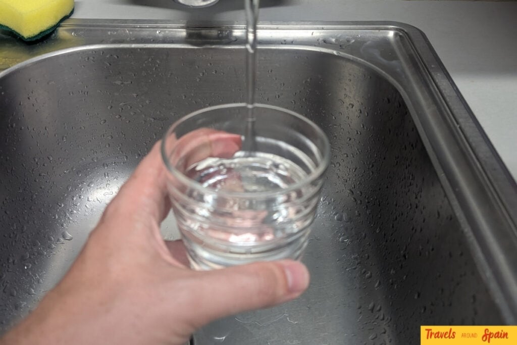 Glass of tap water on counter in Sitges apartment