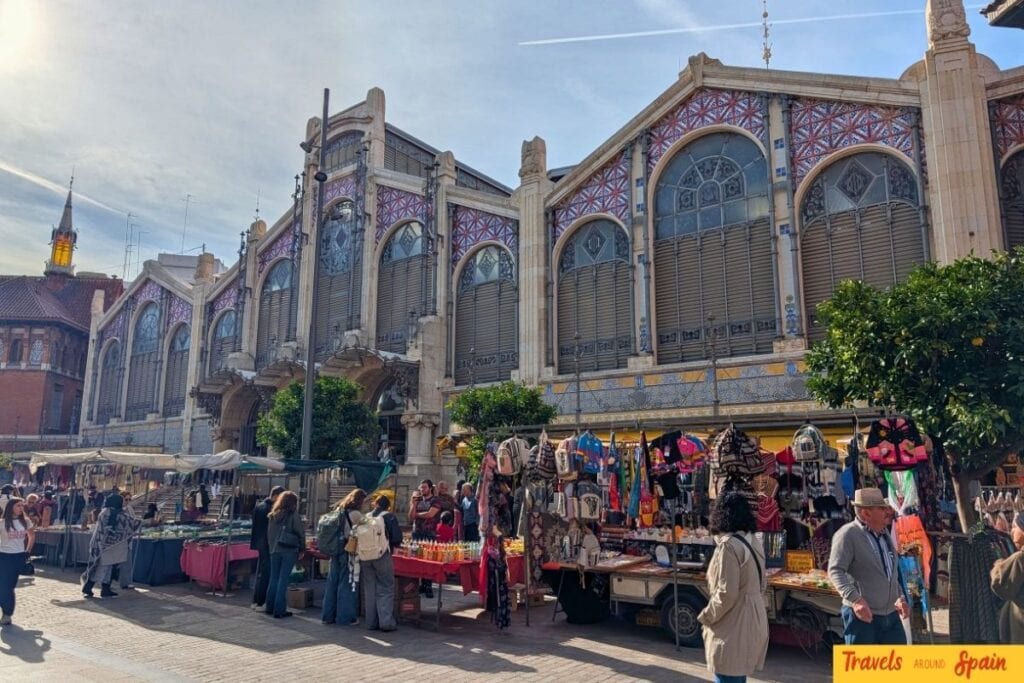 Mercado Central in Valencia with stalls and shoppers in November.