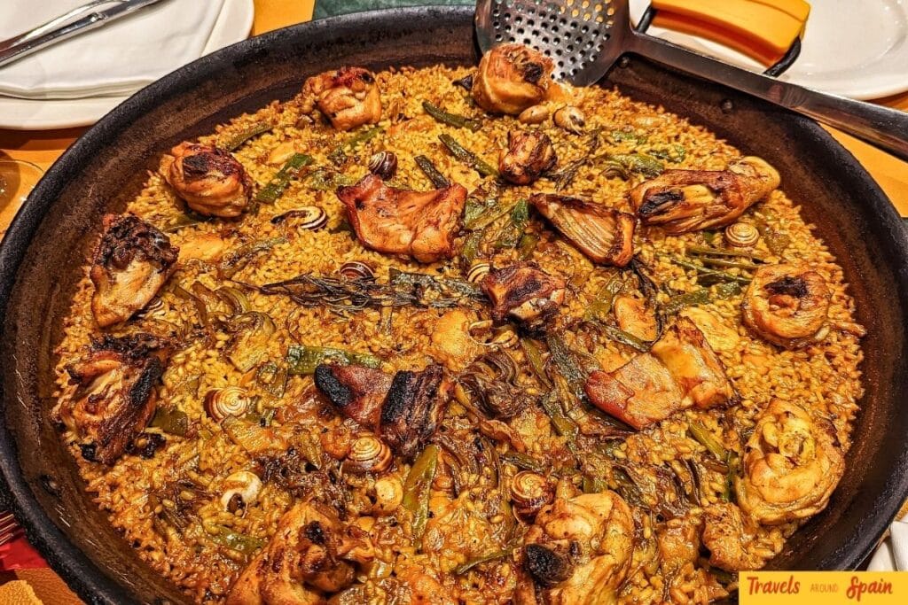 Traditional rabbit paella served in Valencia.