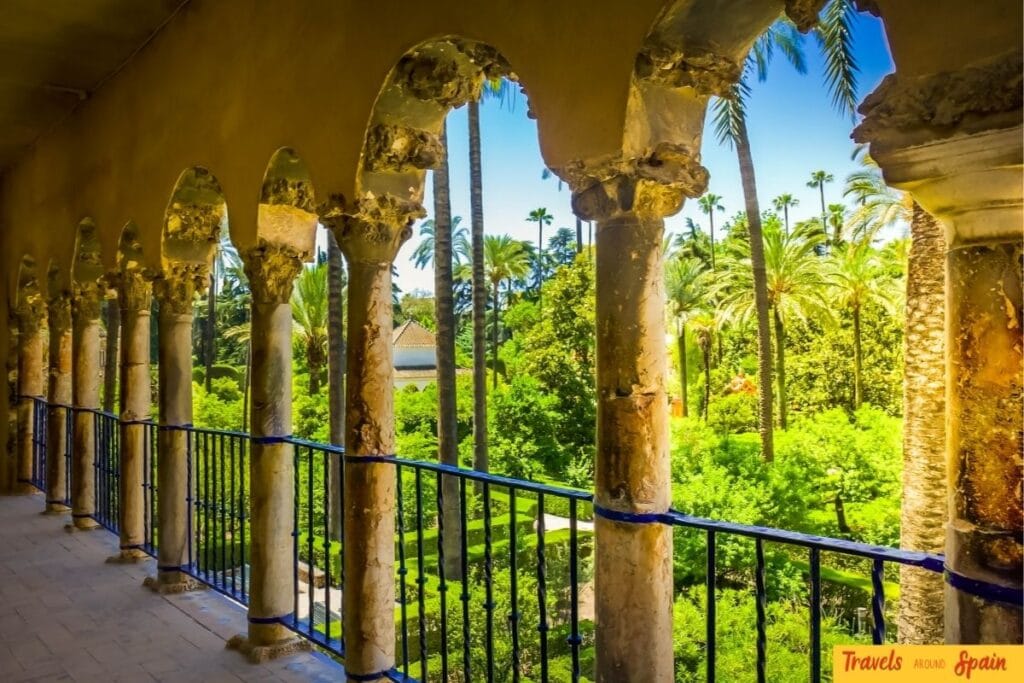 Gardens and arches inside the Real Alcázar of Seville