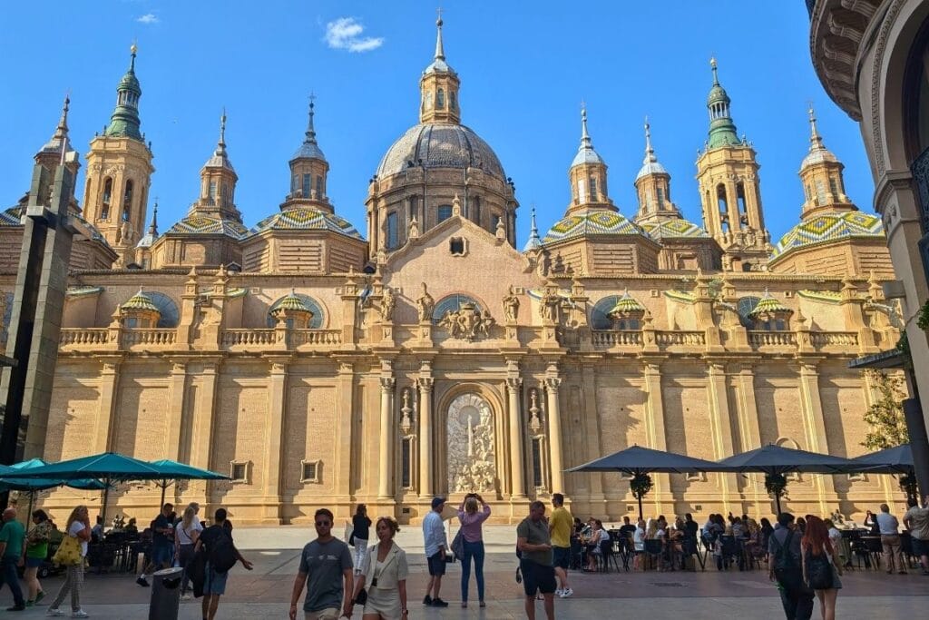 Front façade of Basílica del Pilar in Zaragoza at sunset