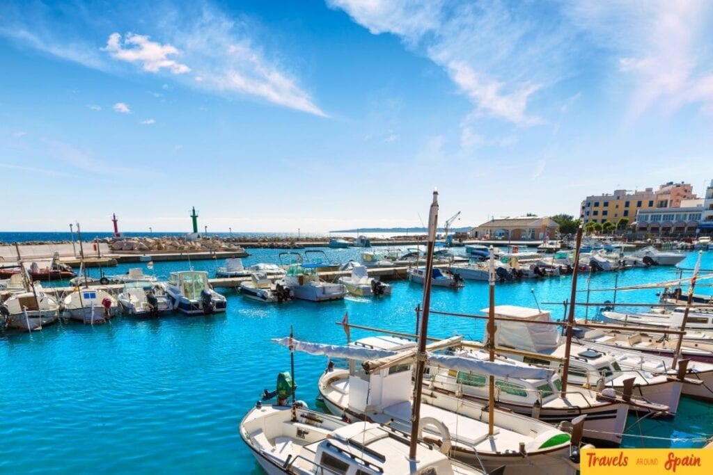 Boats and waterfront views at Cala Bona harbour in Mallorca.