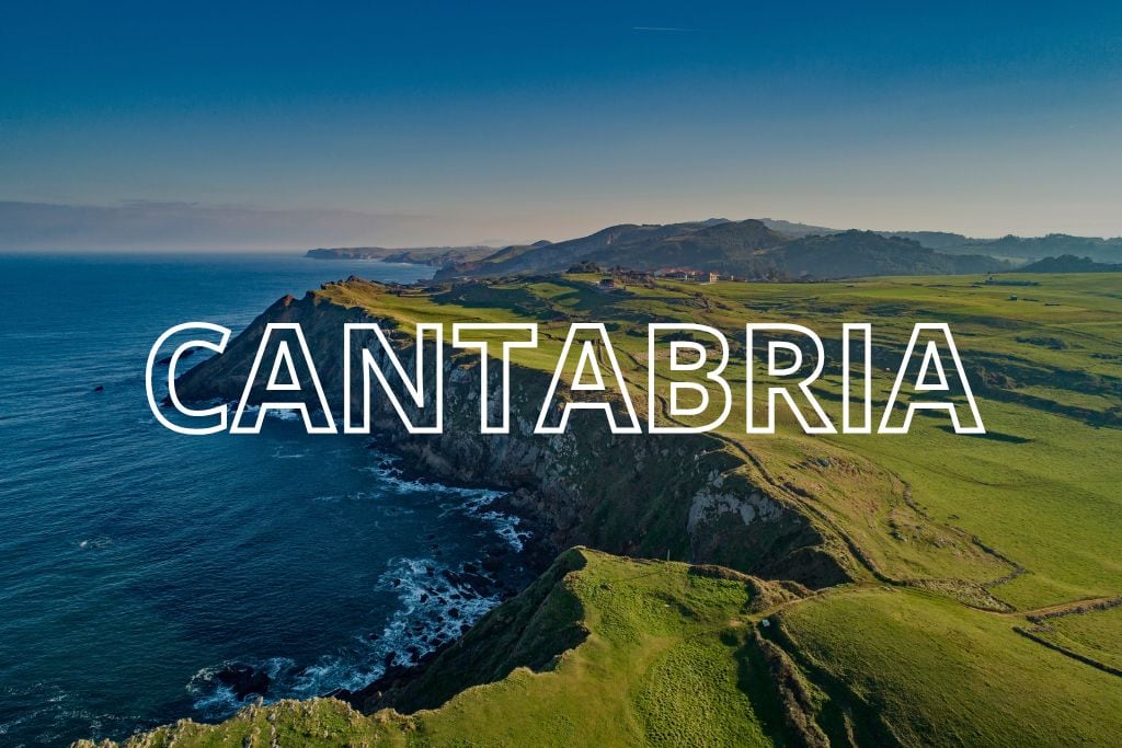A rugged coast in Cantabria with the words Cantabria overlaid in white writing.
