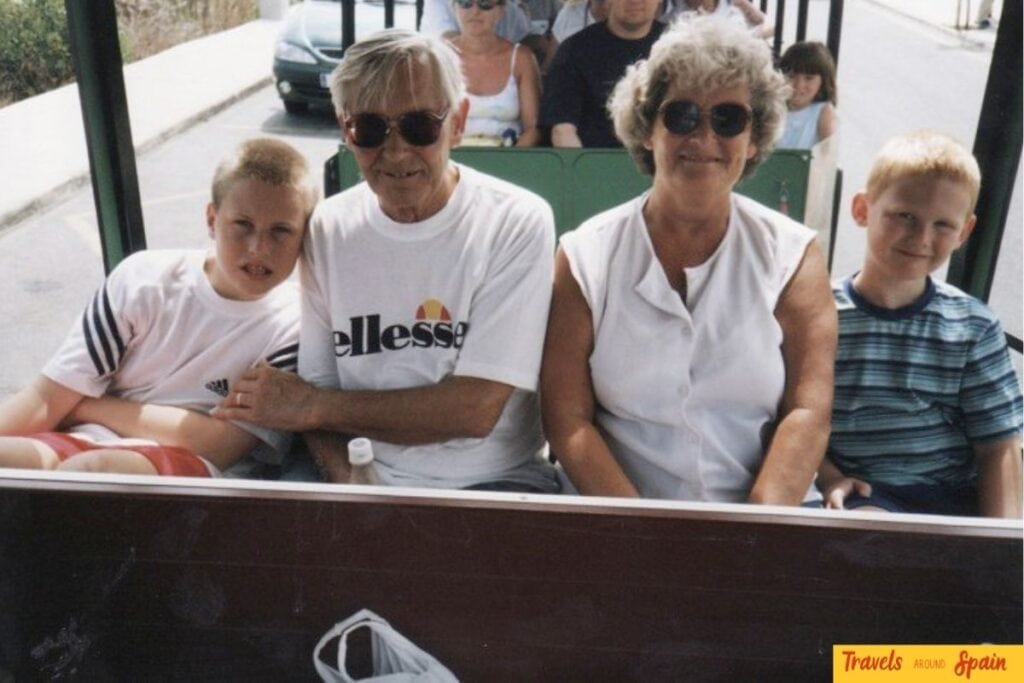 Travelling with grandparents during a family visit to Binibeca in Menorca