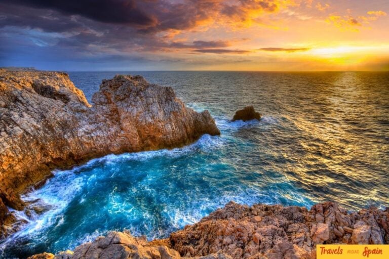 Rocky Balearic coastline at sunset comparing Ibiza, Mallorca and Menorca