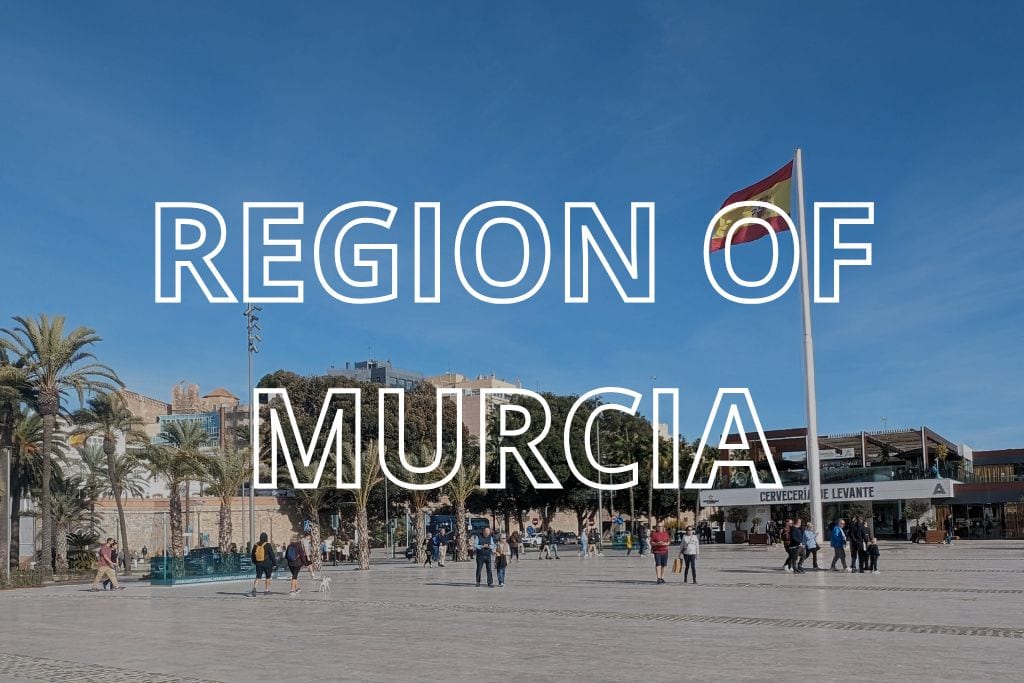 The seafront in Cartagena, with the words Region of Murcia overlaid in white lettering.