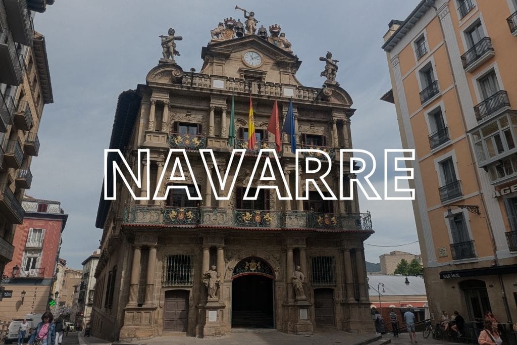 The town hall in Pamplona, with the word Navarre overlaid in white lettering.