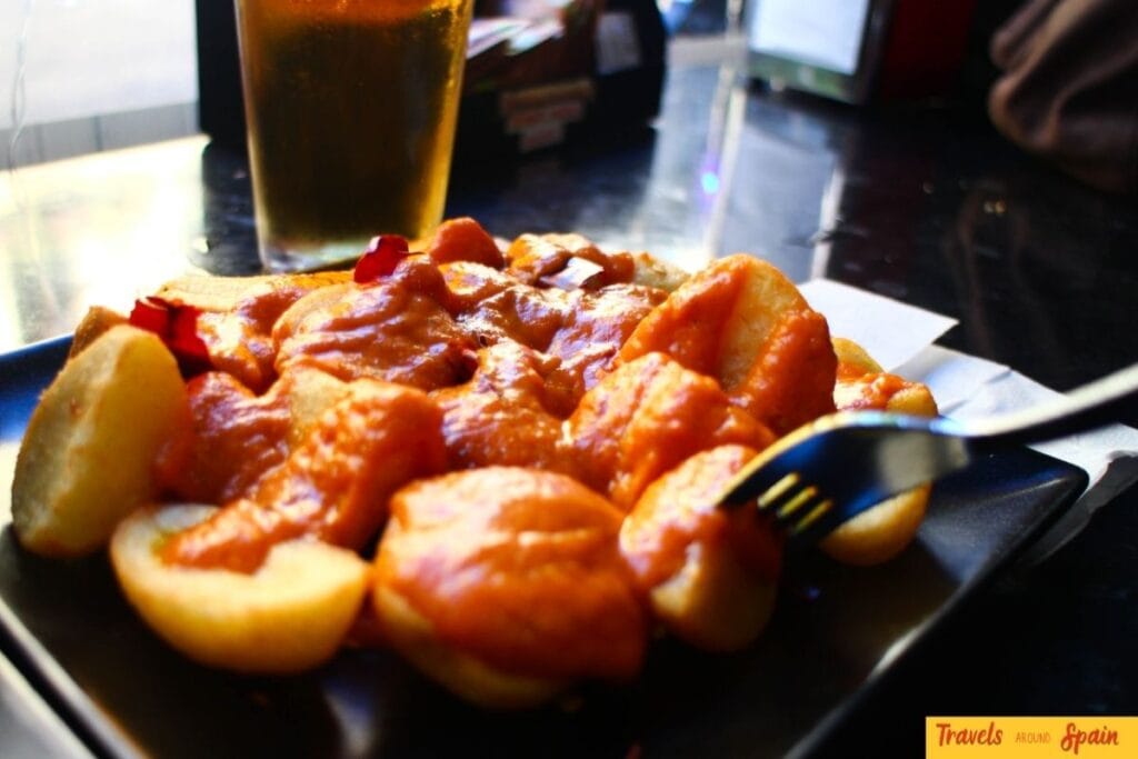 Traditional tapas and drinks during a Seville itinerary