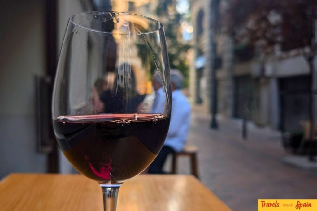 Glass of wine in Zaragoza during a tapas evening.