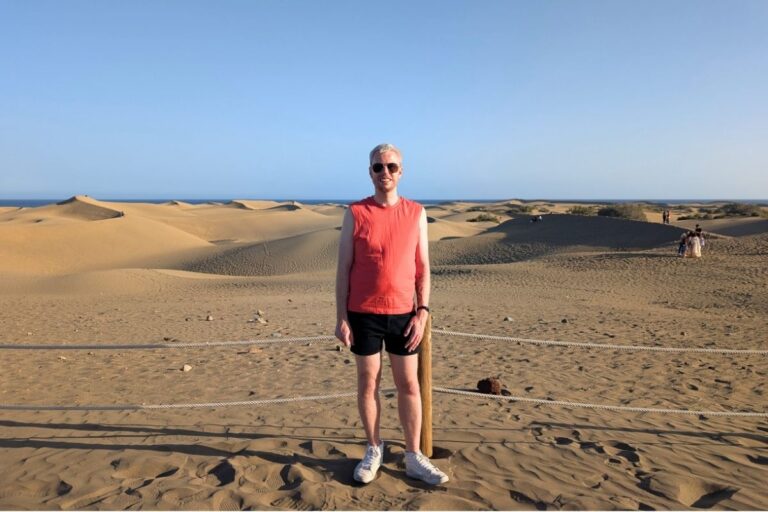 Visitor walking through the Maspalomas Dunes in Gran Canaria