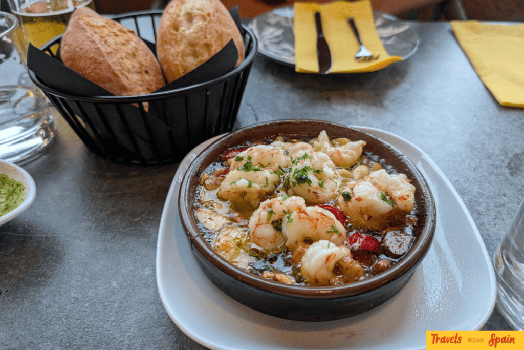 Gambas pil-pil with crusty bread at Wapa Tapa in Maspalomas.