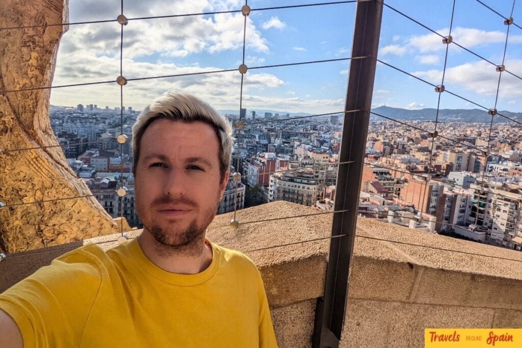Traveller enjoying panoramic views from the towers of La Sagrada Família in Barcelona
