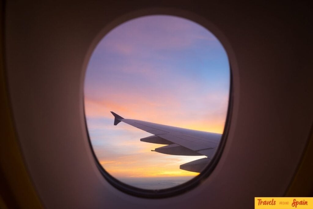 Sunset view from an airplane window during a flight to Madrid.