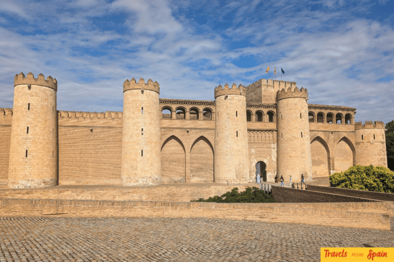 Exterior walls and towers of the historic Aljafería Palace in Zaragoza