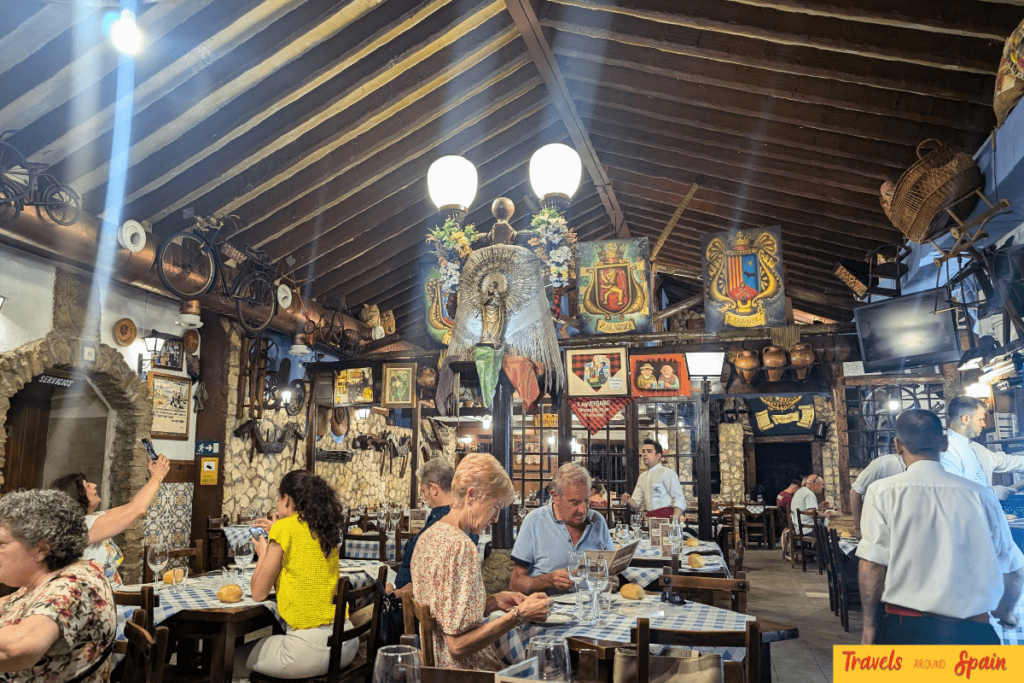Traditional stone-walled interior of Restaurante El Fuelle in Zaragoza